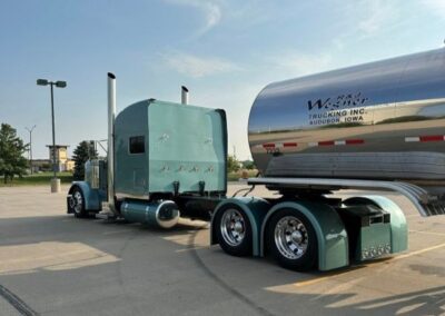 Back of Teal Appeal truck towing a tanker